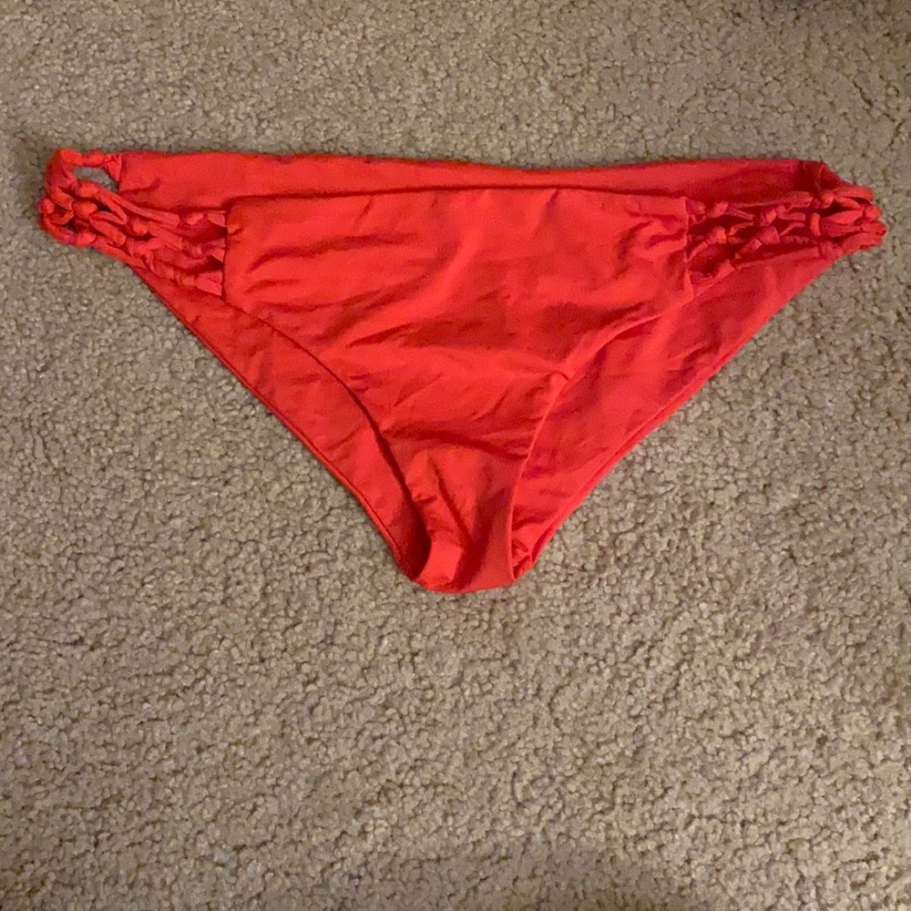 Red almost coral colored bathing suit bottoms